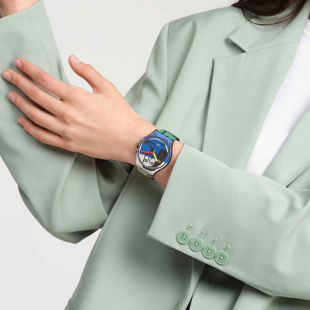 Ceas Swatch Leger's Two Women Holding Flowers SUOZ363 - purtat la mana